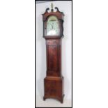 A Late 18th early 19th Century oak and mahogany longcase clock. The case with a twin swan neck