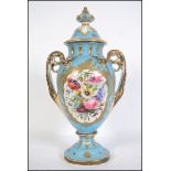 A Victorian ceramic twin handles vase - amphora in the manner of Meissen. The vase with blue