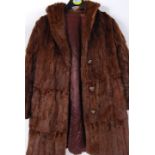 A vintage 20th century ladies three quarter length fur coat in a medium brown  colour. ( Approx size