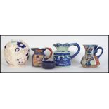 A collection of vintage ceramics to include Ironstone jugs, Mason jar and other items please see