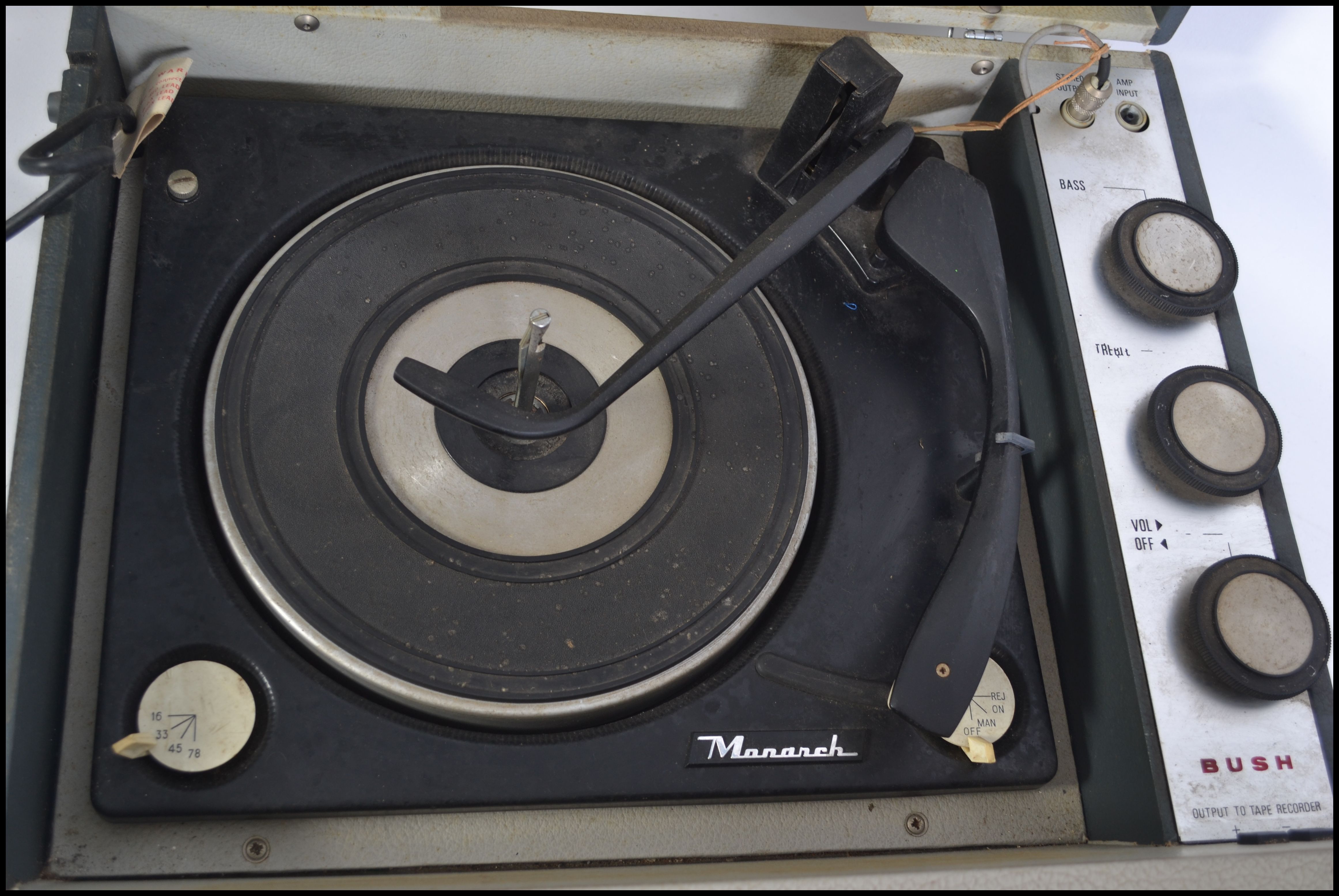 A vintage 1960's Bush portable four speed record player. Having a grey vinyl case with single - Image 2 of 4