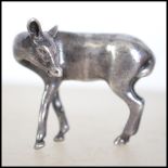 A silver hallmarked 925 miniature figurine of a de