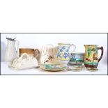 A collection of ceramics to include a Delft harvest jug, Staffordshire Cheese dishes, Victorian