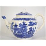 A Royal Worcester blue and white porcelain teapot in the ' Willow ' pattern having green backstamp