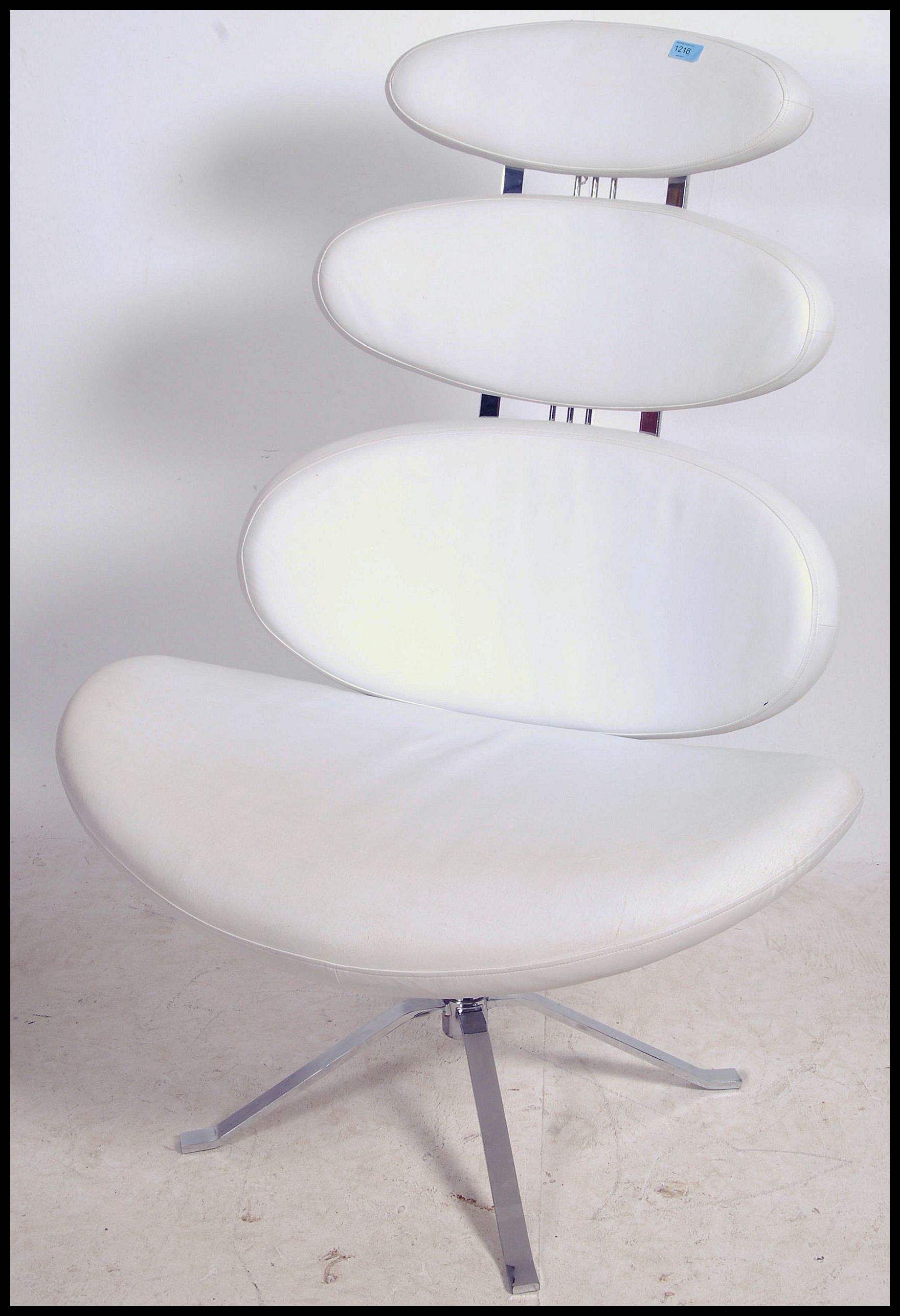 After Poul Volther. A `Corona` swivel lounge chair, with white vinyl upholstery to the pebble - Image 2 of 5