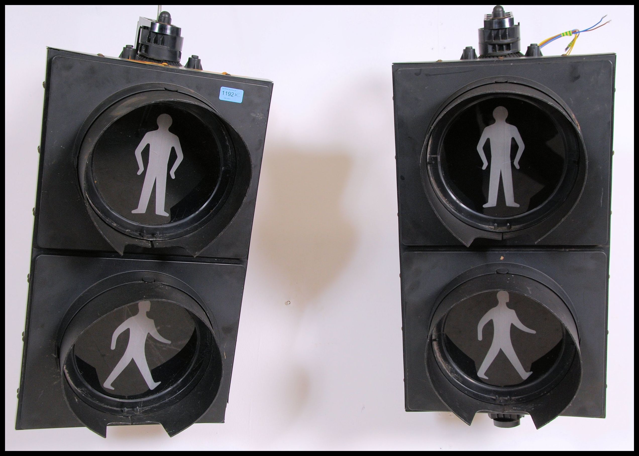 A pair of 20th century / modern LED Industrial traffic lights , the circular screes with hoods set