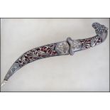 A Silver white metal Persian style dagger with myt