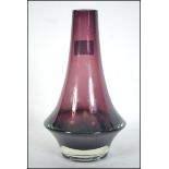 A Danish mid century studio art glass vase of purple coloured form having flared base and tapered
