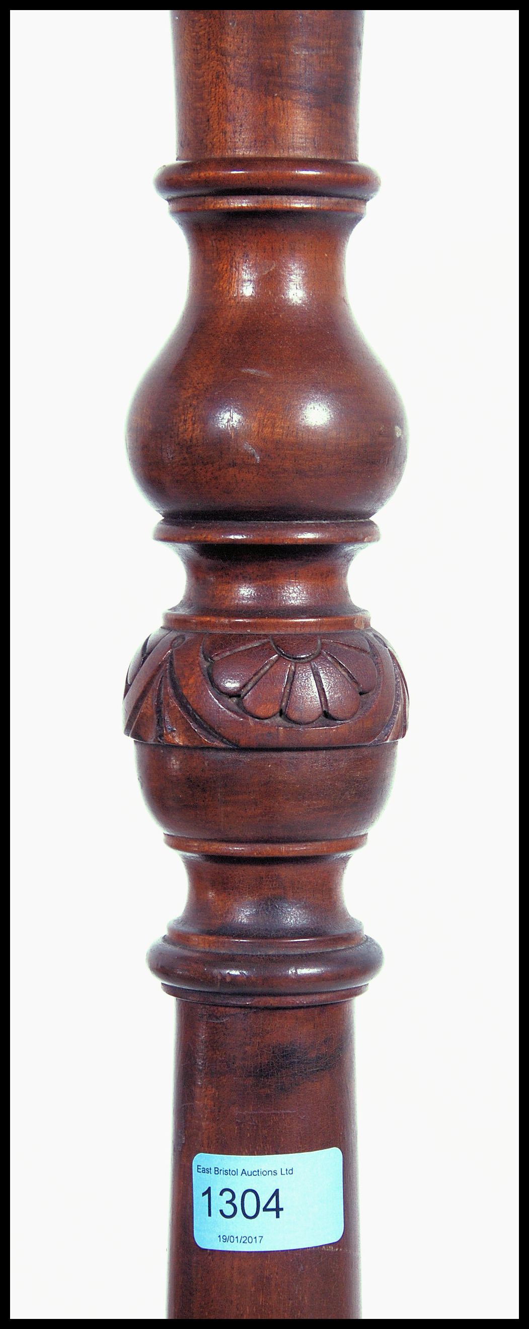 A 19th century mahogany torchere with reeded support raised on tripod feet. - Image 4 of 4