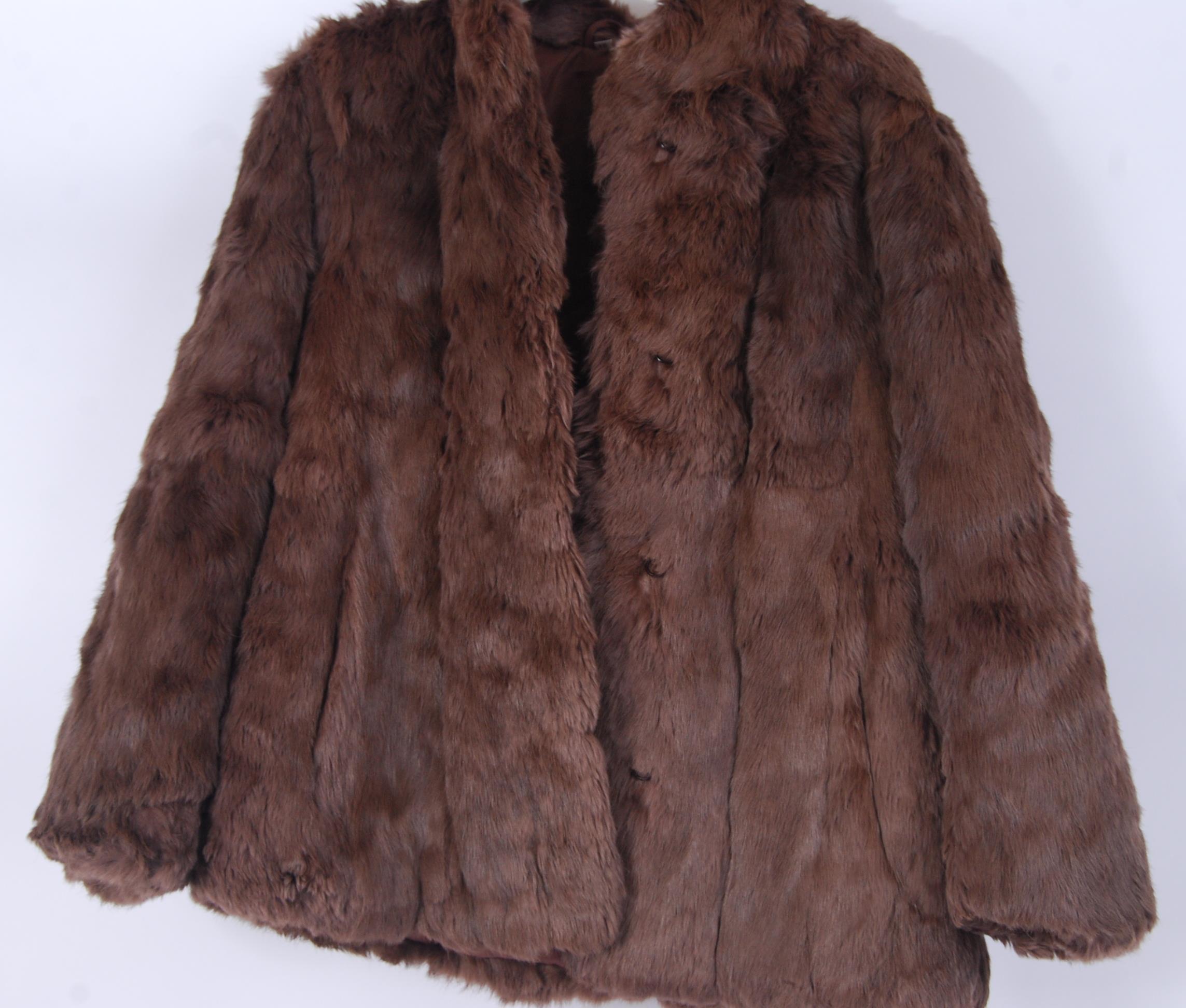 A vintage 20th century ladies hip length fur coat ( possibly rabbit ) in a medium brown colour. (