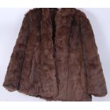 A vintage 20th century ladies hip length fur coat ( possibly rabbit ) in a medium brown colour. (