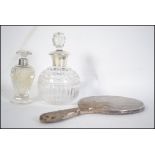 Two cut glass silver hallmarked collared perfume b