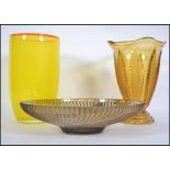 A group of three pieces of 20th century glass dating from the earlier part of the century to include