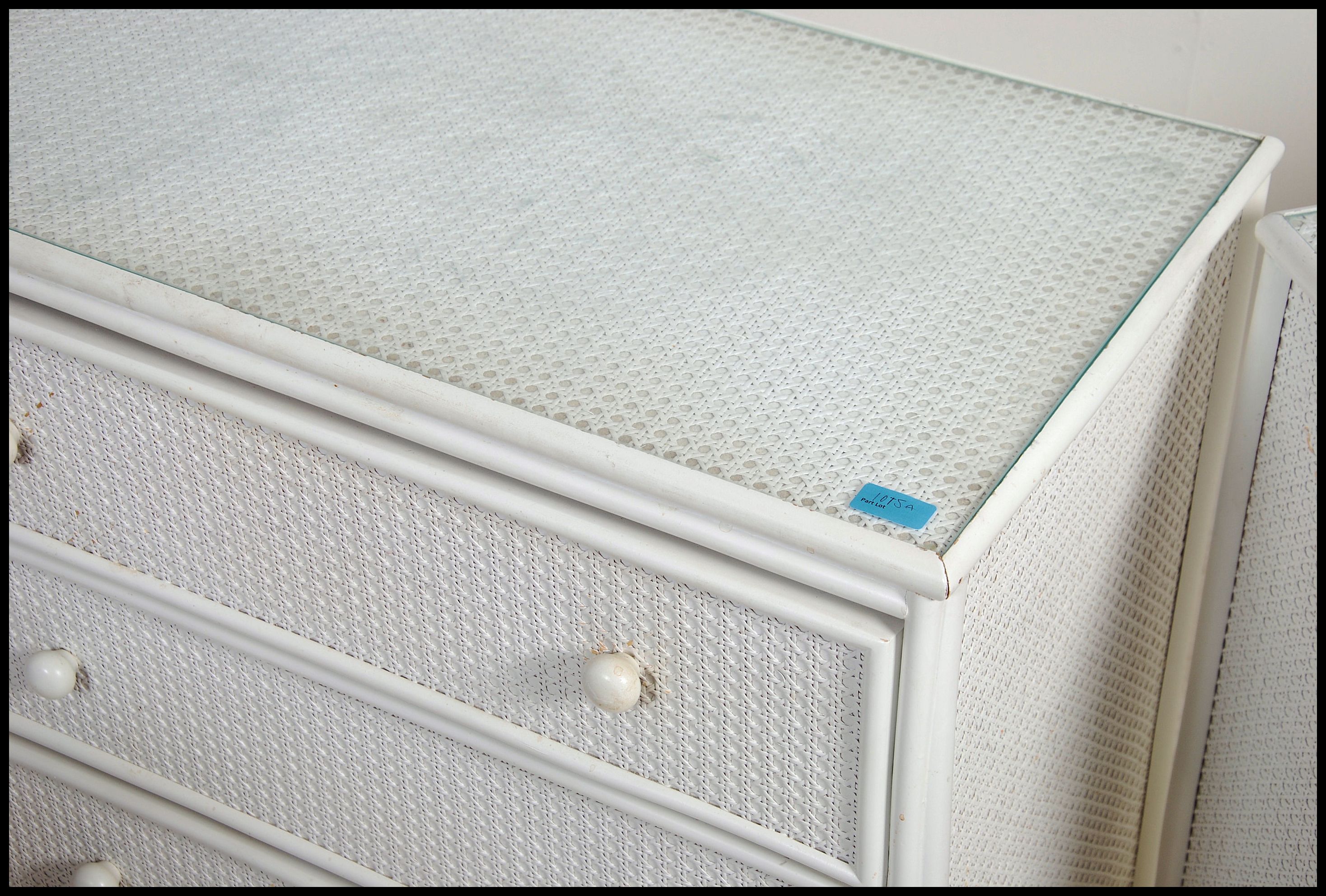 A pair of 20th century whicker effect chest of drawers. Each Chest of drawers having four long - Image 4 of 4