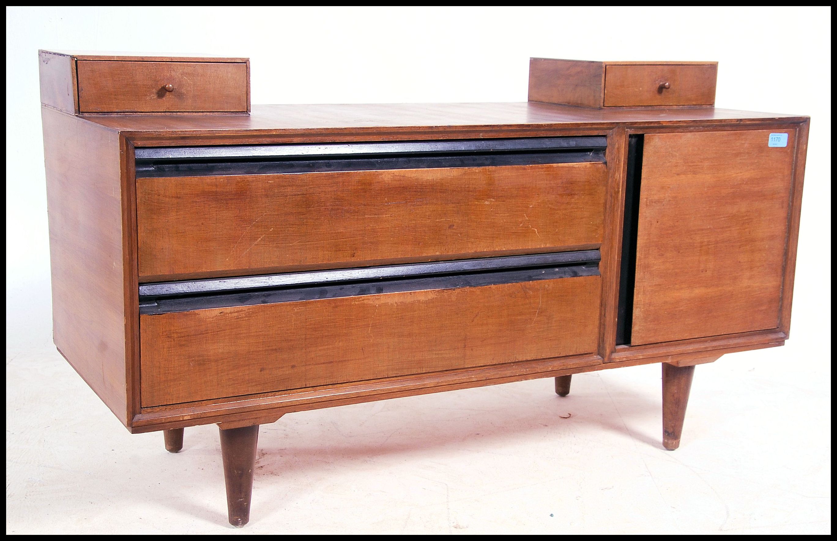 A mid century retro John and Sylvia Reid for Stag C-Range walnut dressing table chest of drawers
