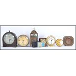 A collection of vintage 20th century clocks  and travel alarm clocks to include a Baby Ben, Sumatic,