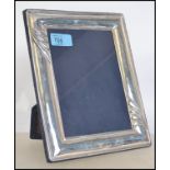 A silver hallmarked picture frame  having baize li