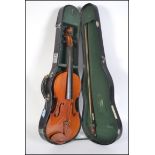 Musical Instruments. A 20th century cased violin by Skylark - complete in the original carry