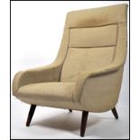 A 1950's teak upholstered believed Danish armchair