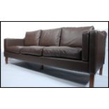 A stunning 1970's style brown leather large three