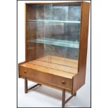 A 1970's Teak Danish Influence sideboard display c