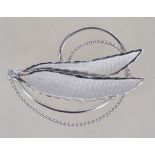 A contemporary Canadian silver brooch wi