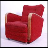 A good 1930's Art Deco club armchair having red mo