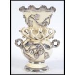 A 19th century lustered embellished vase having vi