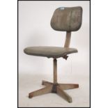 A mid century Industrial office swivel desk chair