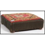 An early 20th century foot stool of square form ha
