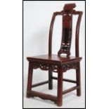 A 19th century Chinese laquered horseshoe chair ha