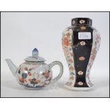 A Chinese Imari teapot complete with the lid havin