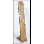 An upcycled 20th century wooden retro wine rack of