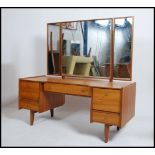 A vintage mid 20th century teak wood dressing tabl