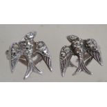 A fantastic pair of silver and marcasite Art Deco clips in the form of swallows in flight being