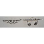 Two silver 925 brooches one being a Celtic knot bow brooch and the other being a Celtic cloak pin