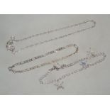 Three silver 925 bracelet chains one being a rope twist chain with a claw clasp with a heart charm