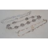 Three silver 925 bracelet chains one having Celtic knot shield spacers and hook clasp, one having