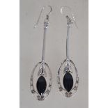 A pair of silver 925 ladies drop earrings having a naturalistic oval design with flowered border