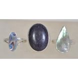 A group of three silver 925 dress rings to include a ring with a large mother of pearl tear drop