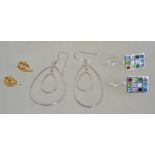 Three pairs of silver 925 earrings to include a double drop tear drop pair, a contemporary pair