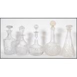 A collection of 19th and 20th century cut glass decanters with stoppers, various designs and styles.