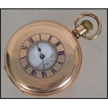 An early 20th century half hunter pocket watch with crown wind action by Record. The dial marked