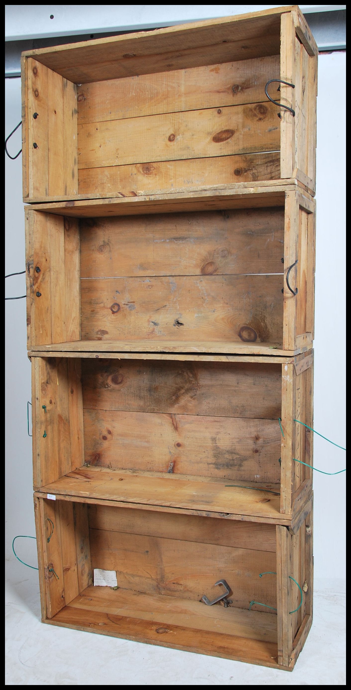 A stack of 4 vintage large wooden Industrial size crates. Panel seats and slatted bases with