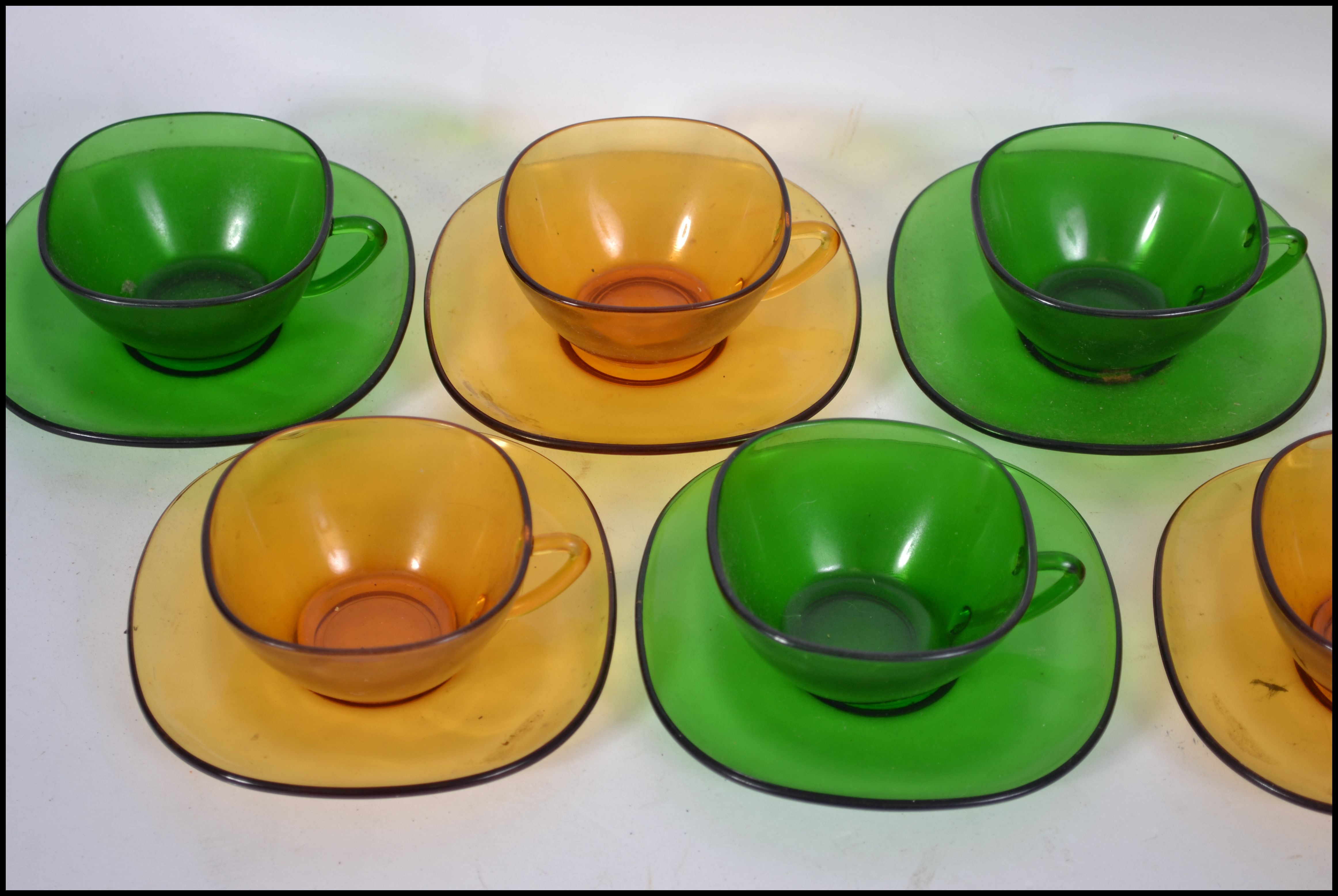 A group of eight French pressed coloured glass coffee cups and matching saucers - Image 4 of 5