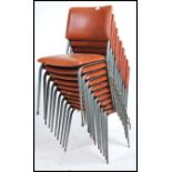 A set of 10 vintage 1960's school / Industrial hall chairs raised on grey tubular metal frames