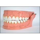 An unusual 20th century retro pair of oversized hinged teeth by Blend a Med. Possible for shop