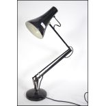 A vintage Herbert Terry post war anglepoise desk lamp in original black paint. Circular terraced