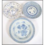 Three pieces of 19th century blue and white porcelain plates  to include Delft signed to base, two