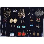 A group of 20 costume jewellery earring pairs to include, Art Deco style, filigree, an enamel